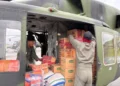 Satgas Yonif 122/TS Kirim Bantuan Logistik Lewat Udara ke Desa Terisolasi di Tapteng