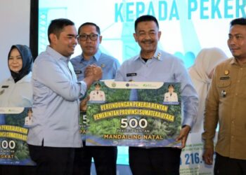Hadiri May Day Sumut 2026, Bupati Madina Terima 500 Kartu BPJS Ketenagakerjaan