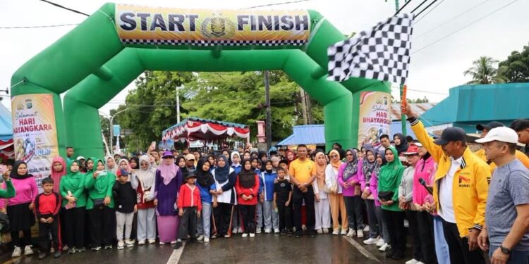 Hujan Tak Surutkan Semangat Warga Panyabungan Rayakan HUT Bhayangkara