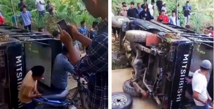Mobil Pelayat Terbalik Saat Melintasi Jalan Rusak Parah Menuju Desa Lubuk Bondar Panjang